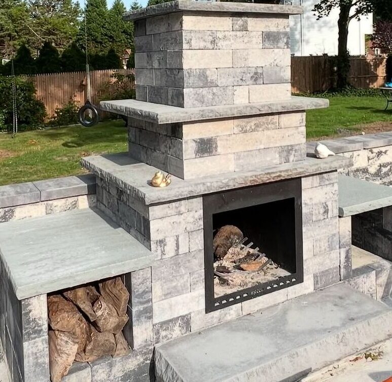 A beautiful custom fireplace built by your expert Long Island Masonry Contractor, Constructive Greens.